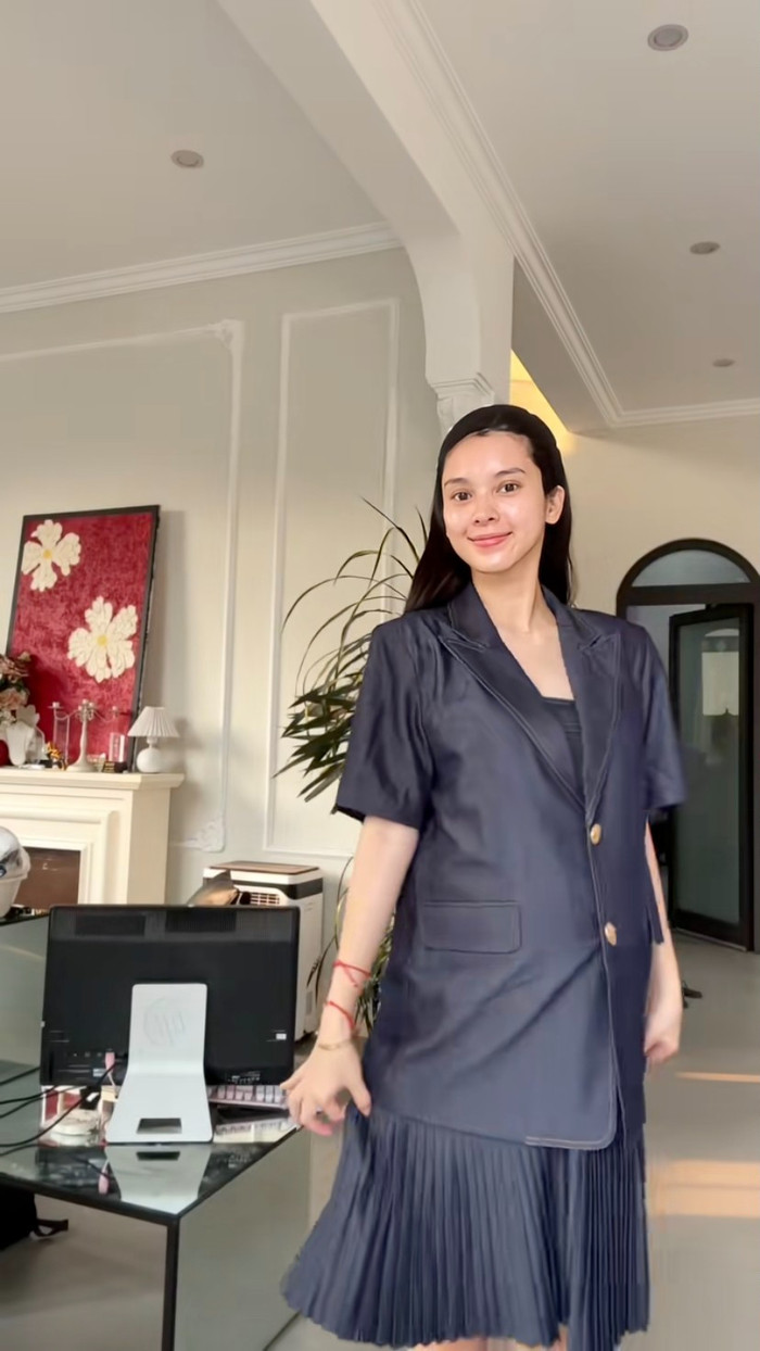 Quỳnh Lương vui vẻ 'lên đồ', tận hưởng khoảng thời gian nghỉ dưỡng khi mang bầu. Ảnh: TikTok Nhân vật